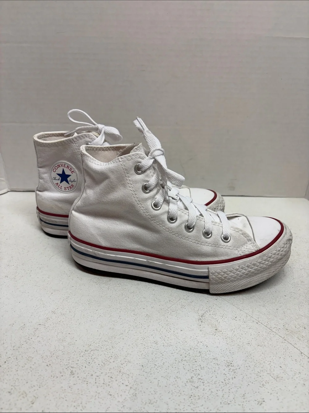 Converse White High Top Sneakers with Red and Blue Stripes